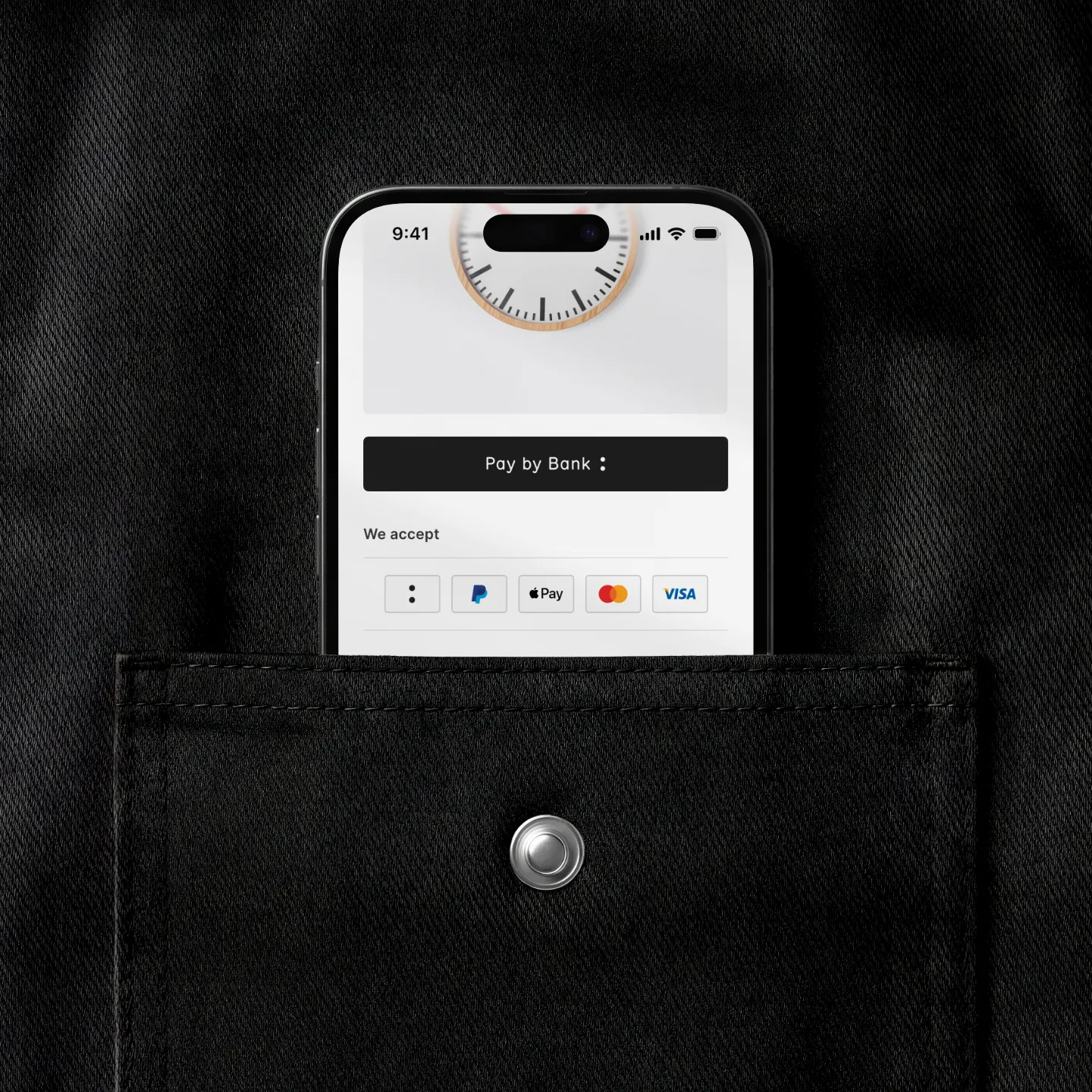 iPhone showing the Pay by Bank button in a checkout screen, half-pulled from a pocket