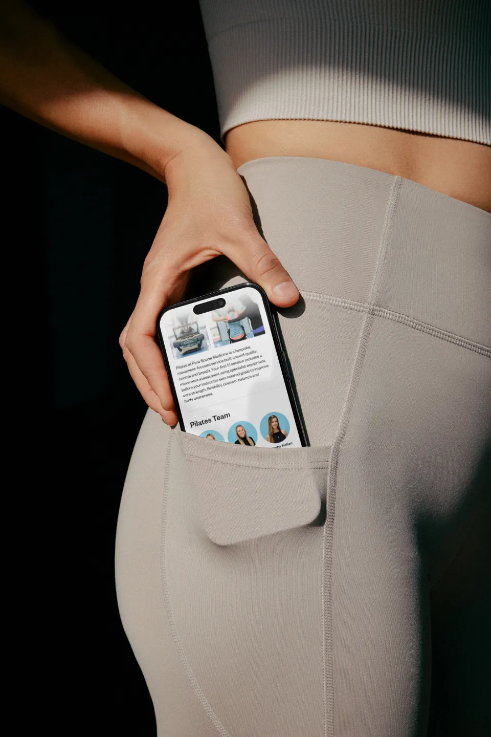 The mobile site pocketed mid-session — the Pilates page slipped into an athlete’s legging pocket