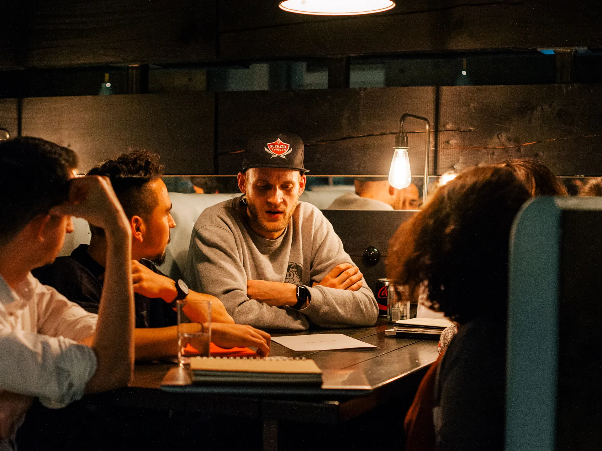 Meeting young creatives to review their portfolios and determine the best ways to help them express their creativity on platform